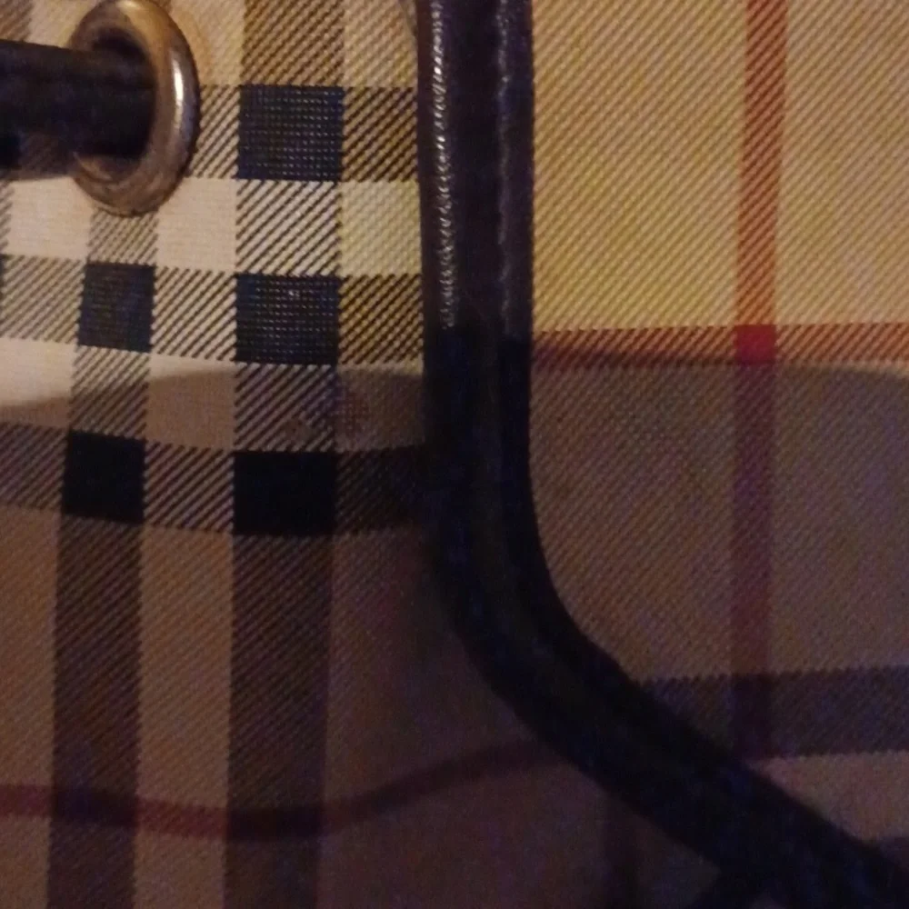 > Plaid Tan and Black Backpack